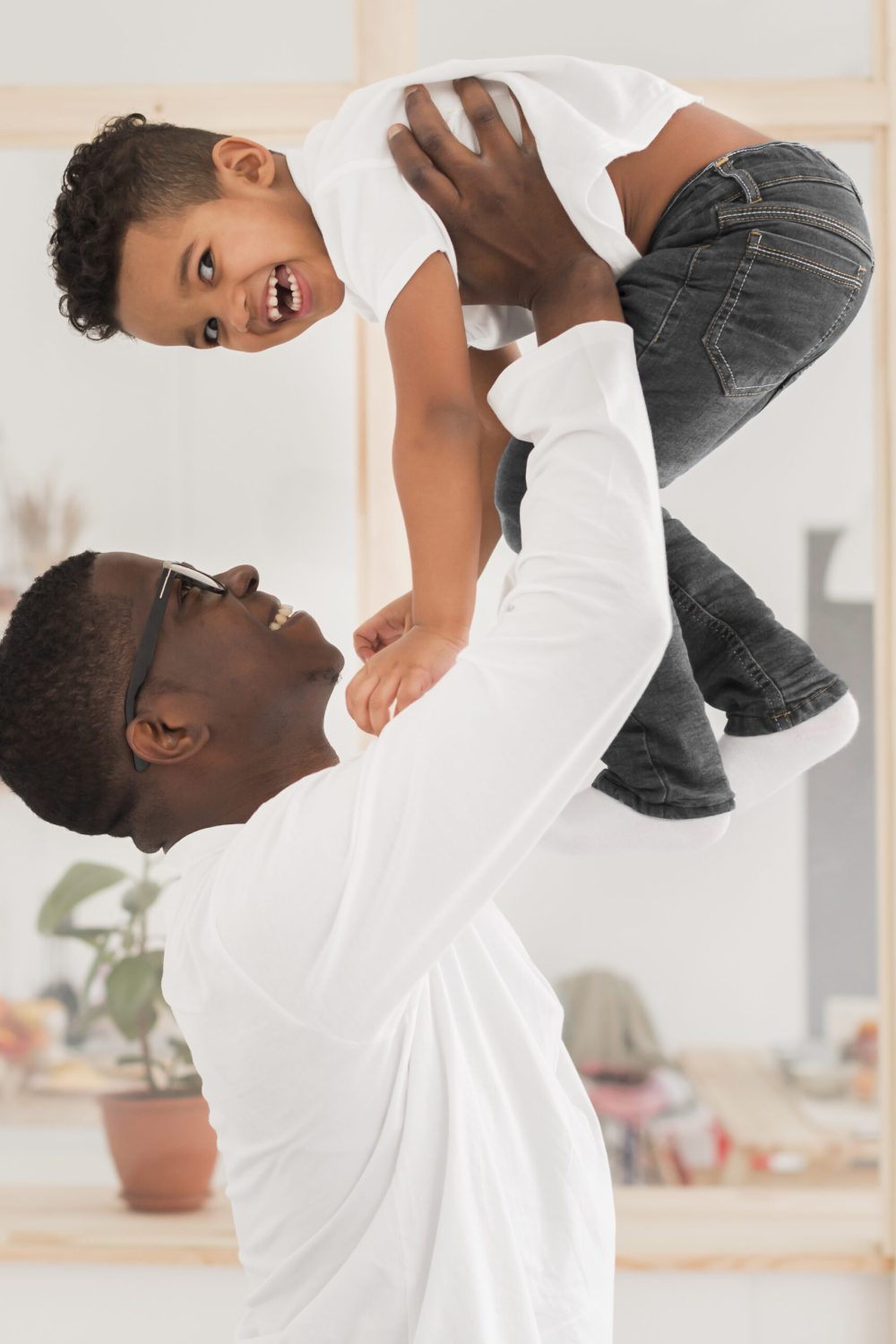 father-playing-with-his-son-indoors